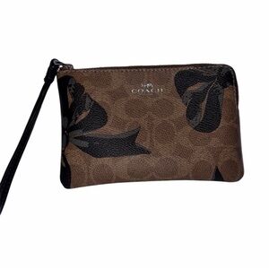 Coach Corner Zip Wristlet In Signature Canvas with Bow Print Black CZ440